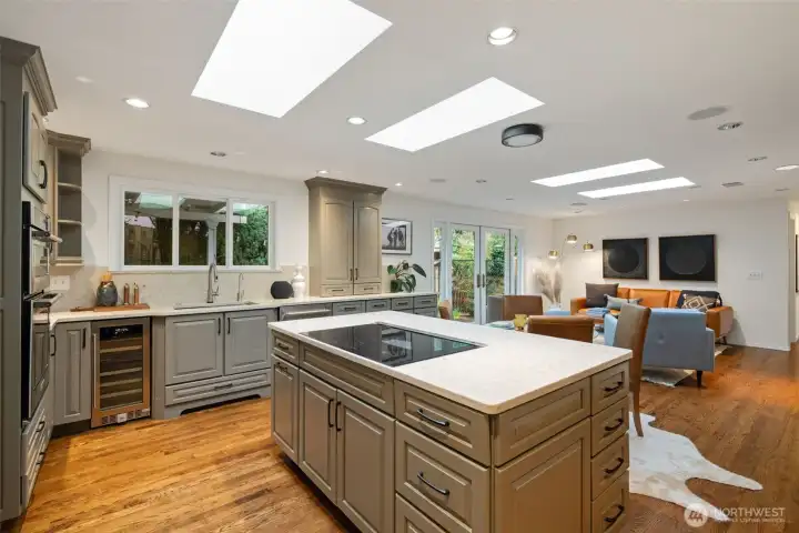 Open kitchen, eating space and living room