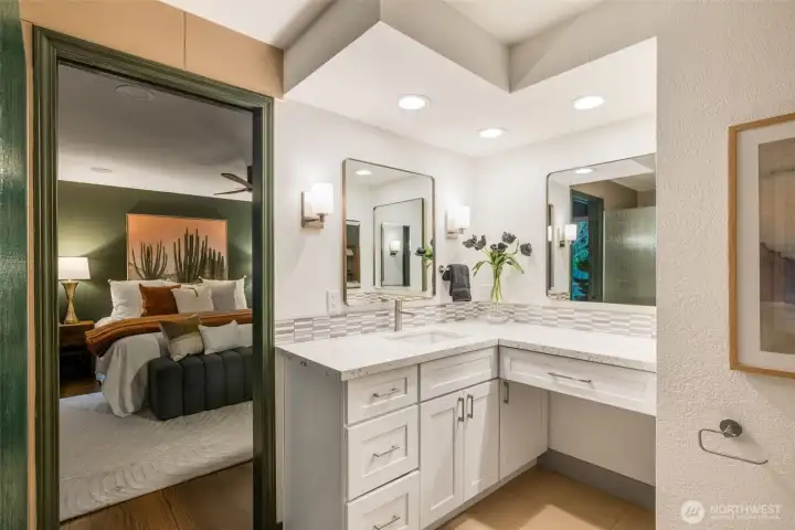 Primary bath loopking back into bedroom