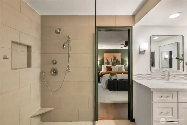 Primary shower, looking back into bedroom