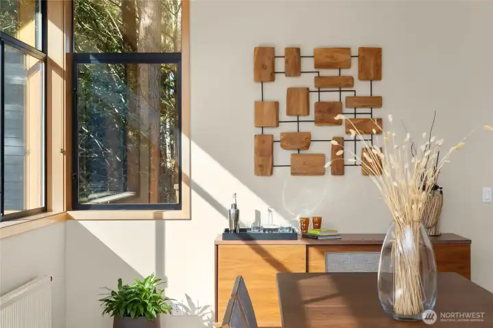 Lovely details throughout with corner windows bringing the natural setting right inside.