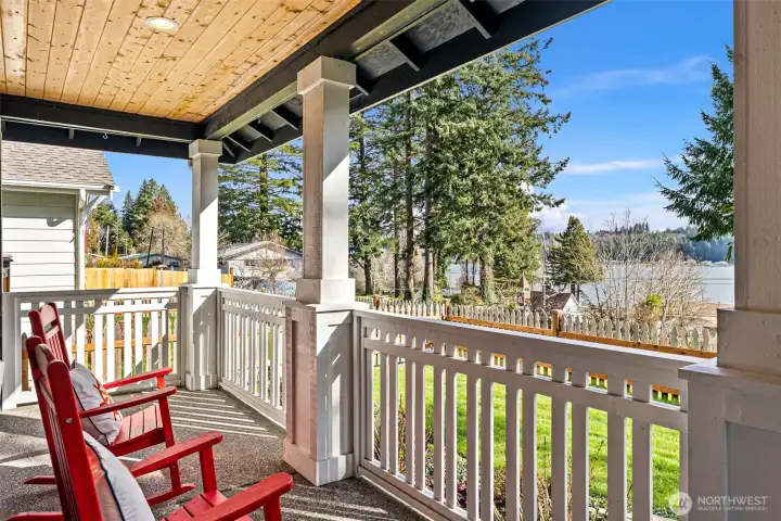 A covered porch invites year-round outdoor viewing.