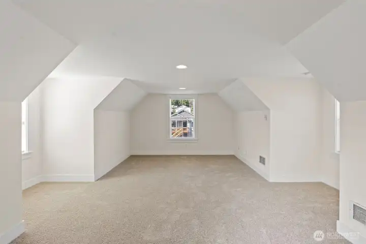 The muti-purpose bonus room may be used as an office, gym, rec-room, or possible ADU.