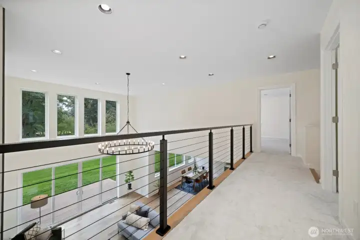 Light and airy lofted second floor with views out to the backyard.