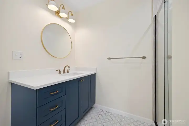 3/4 ensuite bath upstairs in the second primary bedroom.