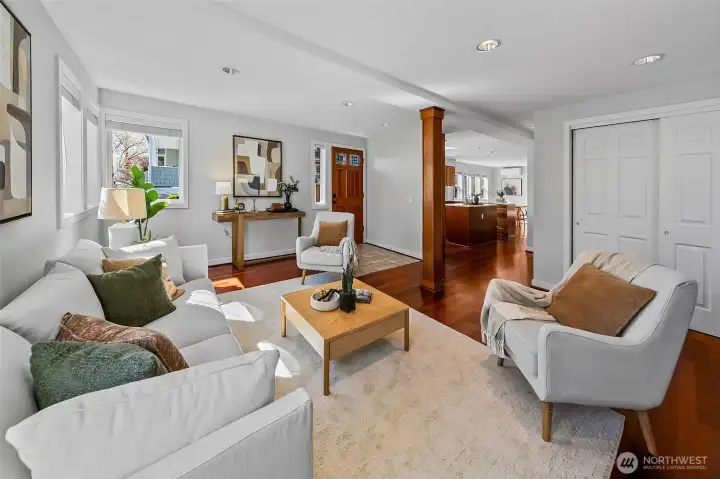 Formal living room with beautiful cherry hardwoods throughout the main floor.
