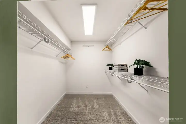 Huge walk-in closet for primary suite.