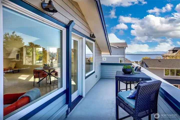 Spacious view deck with new metal caps on the deck rails, perfect for setting down your glass of wine while enjoying the water views.