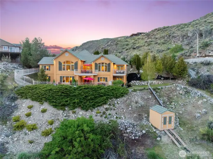 Located overlooking the 12th green at Lake Chelan Municipal Golf Course.  Golf Cart Garage with direct access via the Lewis Clark Trail.