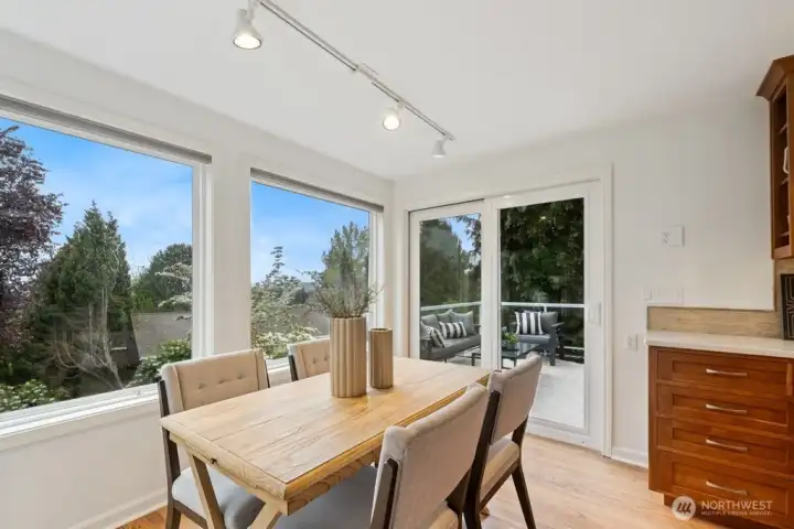 Amazing view from kitchen nook area and access to deck. Amazing view from kitchen nook area and access to deck.