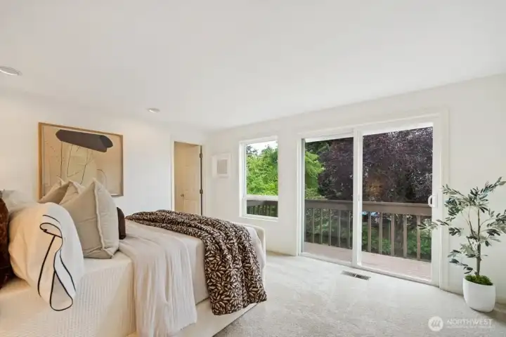 King-sized primary retreat with a private deck access. King-sized primary retreat with a private deck access.