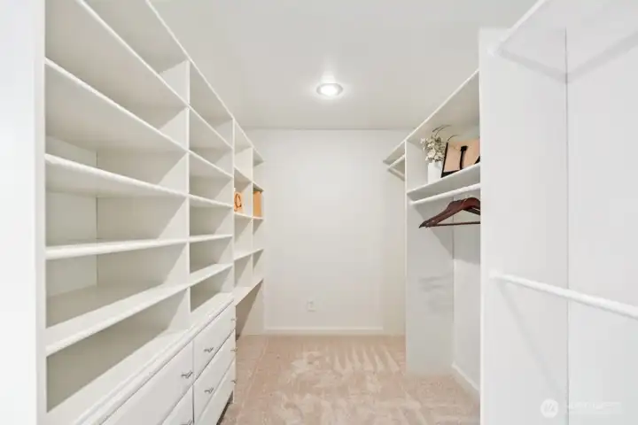 Primary walk-in closet, custom closet organizers Primary walk-in closet, custom closet organizers