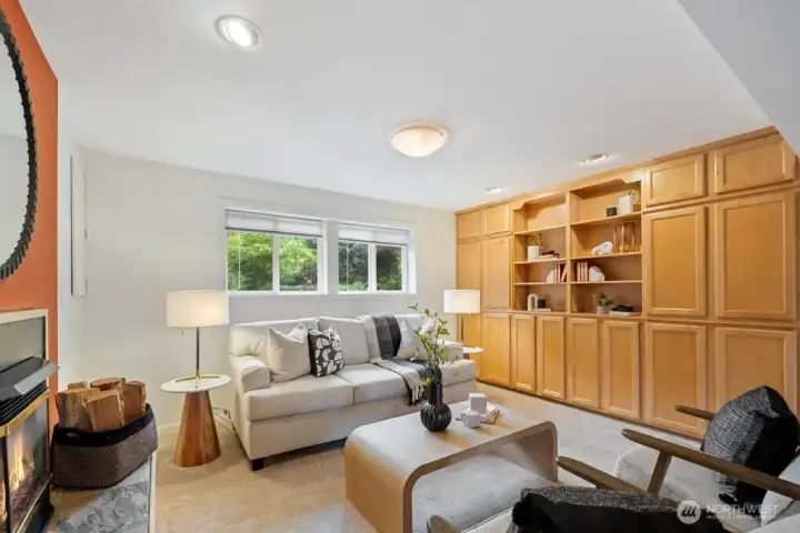 Spacious lower level family room with gas fireplace Spacious lower level family room with gas fireplace