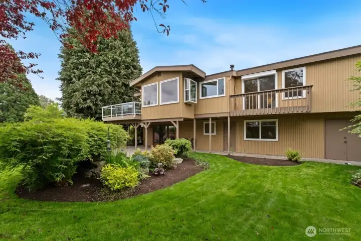 Super-sized manicured fenced yard with lovely water feature, spectacular garden areas and plenty of room for pets and playtime Super-sized manicured fenced yard with lovely water feature, spectacular garden areas and plenty of room for pets and playtime