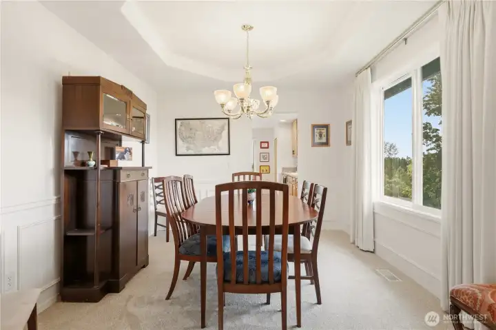 Formal Dining Room opens to Kitchen and Sitting Room Formal Dining Room opens to Kitchen and Sitting Room
