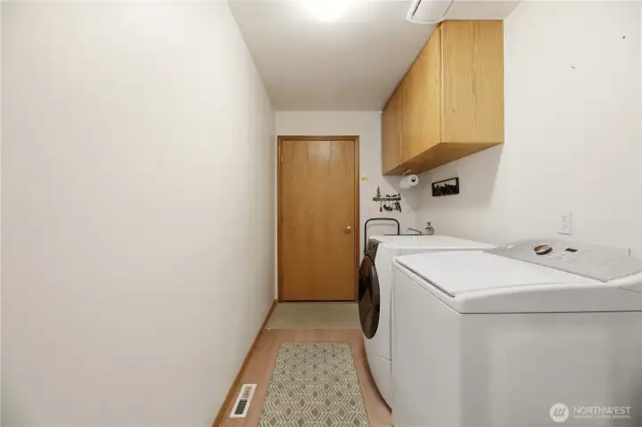 Laundry Room on Main Level with Storage Laundry Room on Main Level with Storage