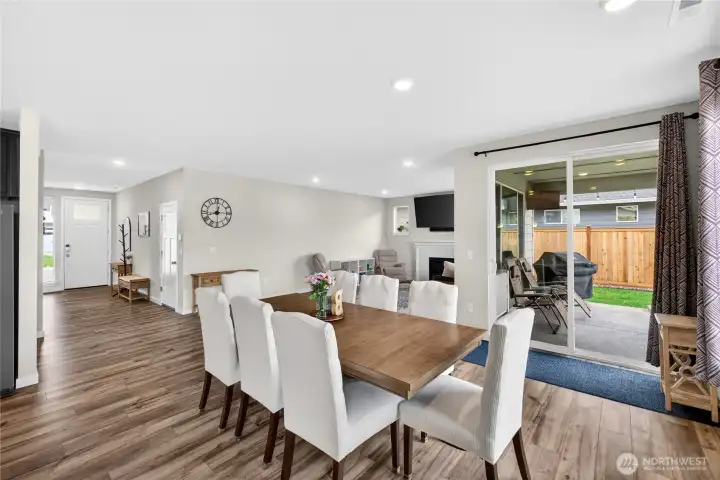 Formal dining space with view of the fenced back yard