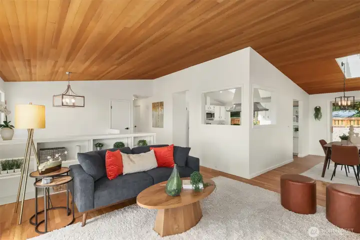 Cathedral wood-plank ceilings, refinished oak hardwood floors, fresh interior paint