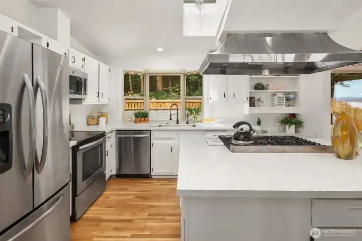 Large, chef's kitchen overlooking the backyard, perfect for you culinary adventures