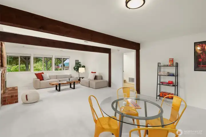 Spacious family room with gas fireplace on the lower level offers a second gathering place for fun and entertainment