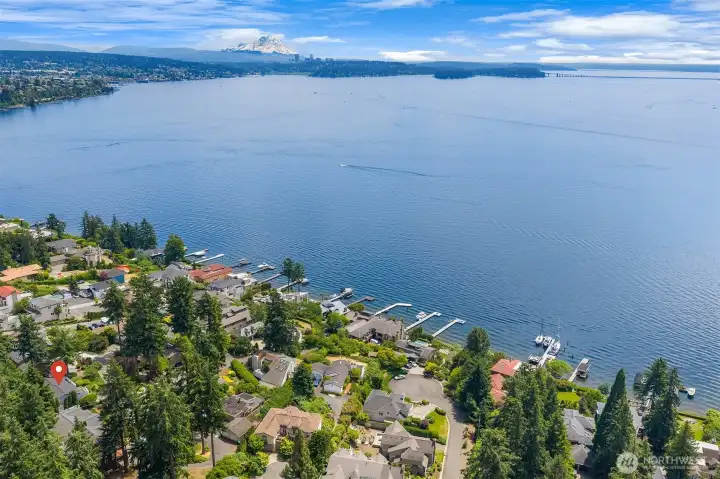 Tucked away on a quiet private road with private beach rights, yet just minutes from parks, highways, and all the shopping, dining, and waterfront attractions of downtown Kirkland