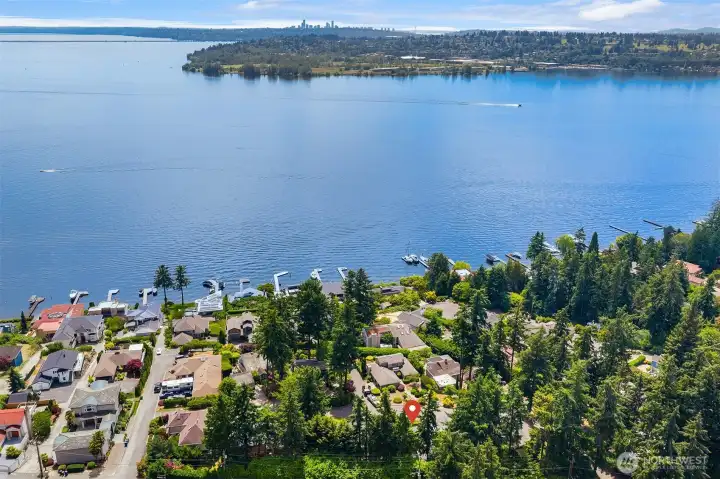 Tucked away on a quiet private road with private beach rights, yet just minutes from parks, highways, and all the shopping, dining, and waterfront attractions of downtown Kirkland