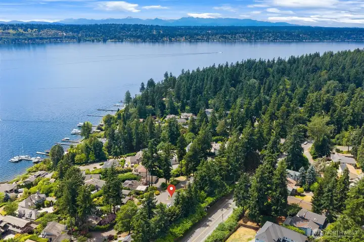 Tucked away on a quiet private road with private beach rights, yet just minutes from parks, highways, and all the shopping, dining, and waterfront attractions of downtown Kirkland