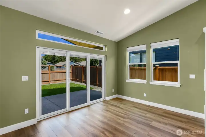 Large dining space with access to back covered back patio