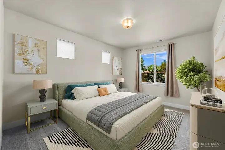 Primary bedroom offers extra space for king sized bed and fills with natural light *Virtually Staged*