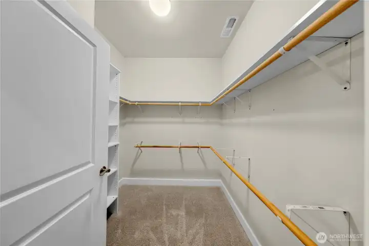 Extra large walk in closet located in primary bedroom