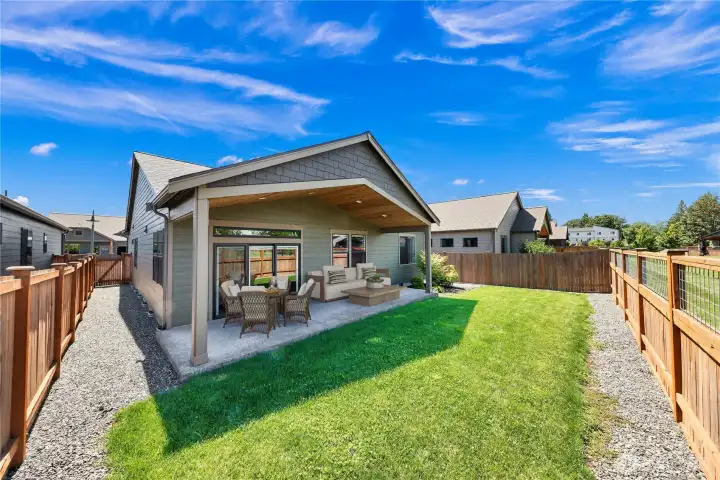 Fully fenced back yard overlooks the green space - no neighbors behind you for additional peace of mind and privacy!