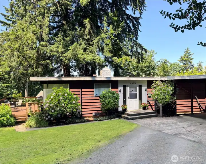 LOCATION! This home is deceiving from the front and mostly hidden from the street. Come explore the potential here. Bring your contractor, builder, designer and consider your options for the amazing property. The lot is approx 145' x 115'. Whether your repair, remodel or build a custom home, there is a lot of potential here.