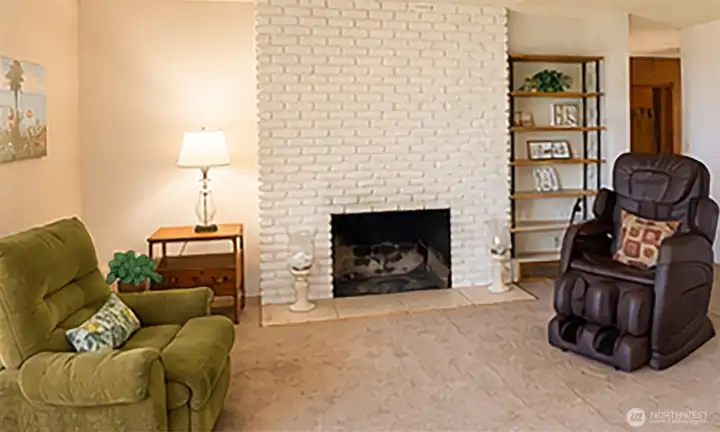 The wood burning fireplace adds a cozy feel on rainy or cold days.