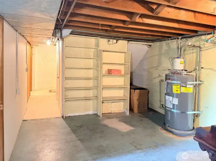 This is the other side of the bathroom in the basement. You can see, expanding or redesigning the bathroom is possible because the area is unfinished. Of course the city would need to approve a permit for your intended plans.