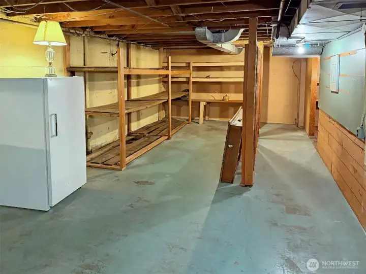 Excellent storage spaces in the unfinished area of the basement.