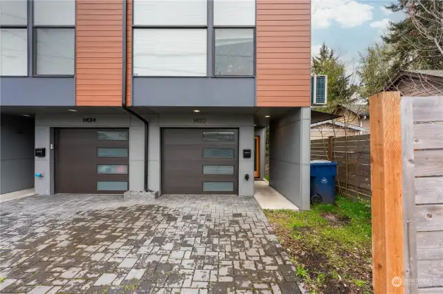 Spacious one car garage and additional parking space in front.