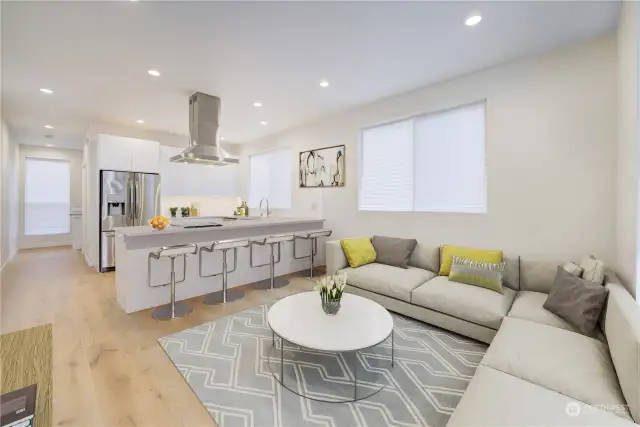Great room living and dining. Engineered hardwood floors throughout.
