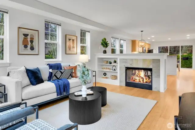 Open floor concept with double sided fireplace.