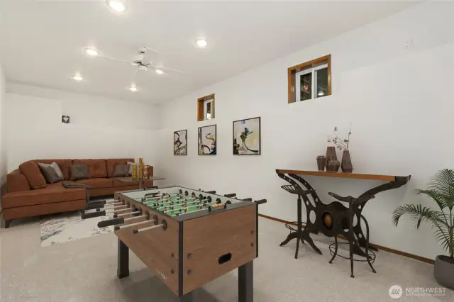 Game room is virtually staged.