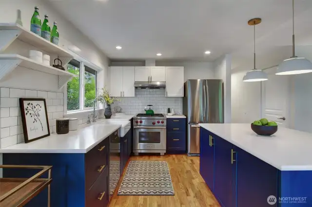 Bright open kitchen with Wolf range/oven