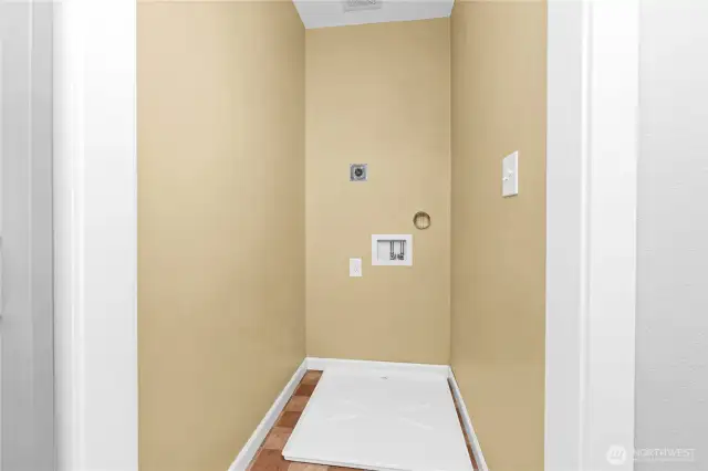 Second floor laundry room, designed for a stackable washer/dryer.