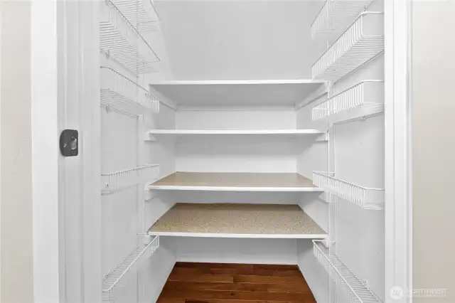 Convenient walk-in pantry...