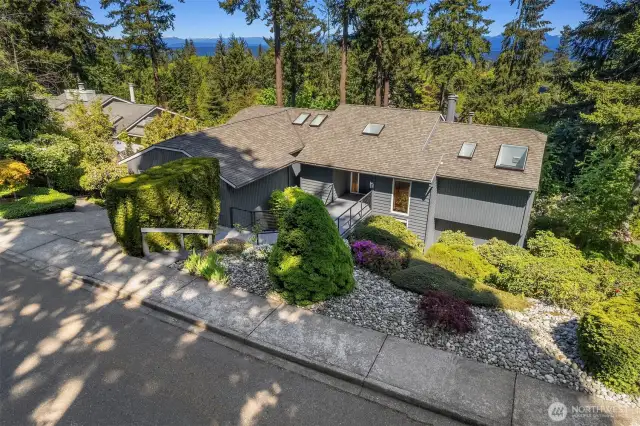 The low-maintenance yard offers handsome curb appeal.
