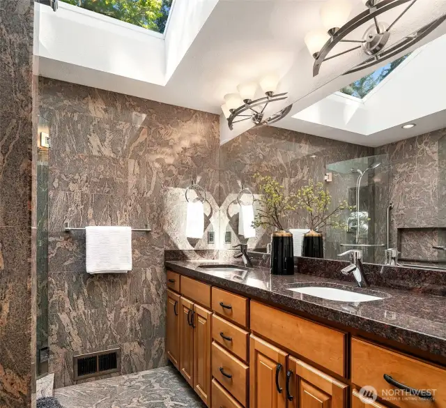 The primary bathroom has been refreshed.