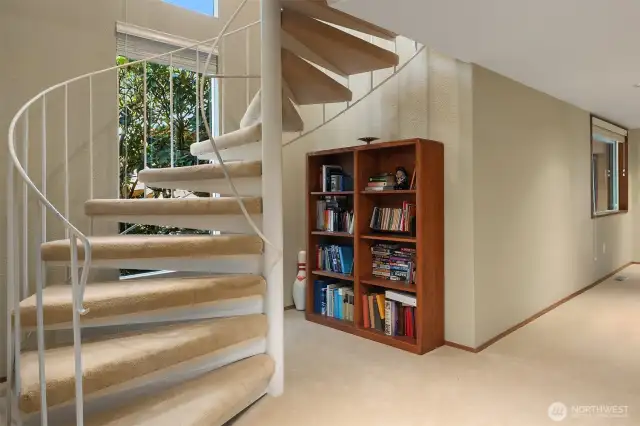 Downstairs, the second level of living is offered.