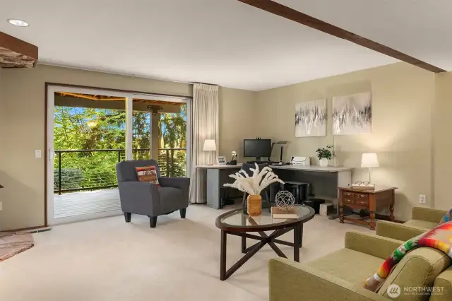 The Family room offers deck access and a neutral palette for extended living, work-from-home or playroom.
