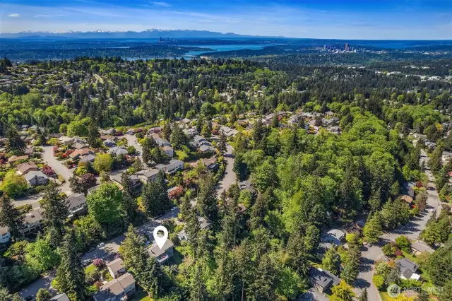 A stunning view of Eaglesmere to I-90, downtown Seattle and downtown Bellevue.