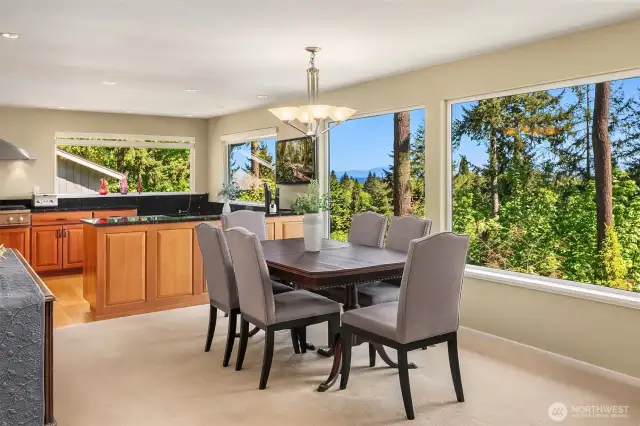 The large picture windows capture the peaceful, territorial views.