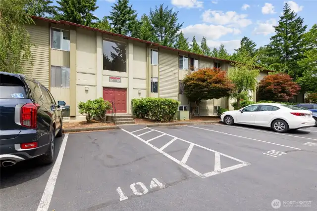 Parking space 104 next to entry