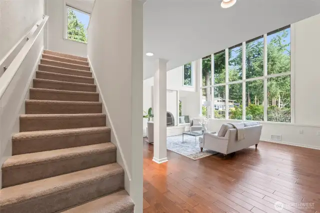 Stairs to second floor where you'll find the primary suite and another bedroom with adjoining bath.
