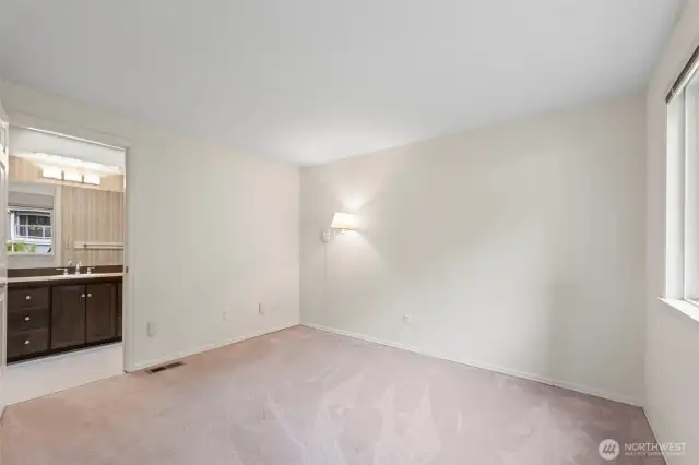 Another bedroom upstairs has adjoining 3/4 bath.